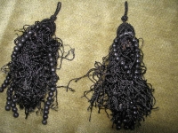 2 Stück Troddeln in schwarz, mit Perlen